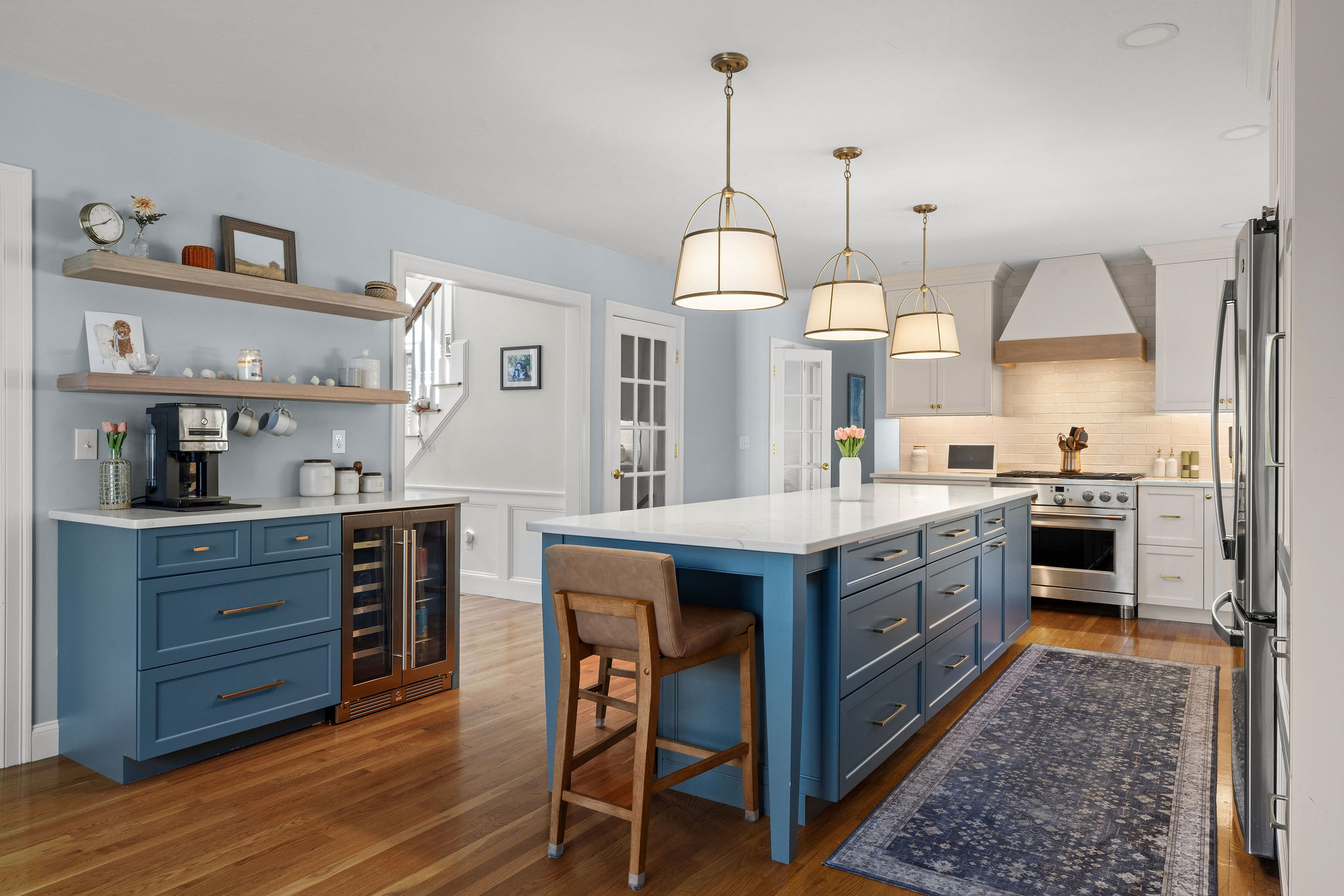 Seaglass island and coffee station with open shelving and a beverage fridge in a Hanover kitchen