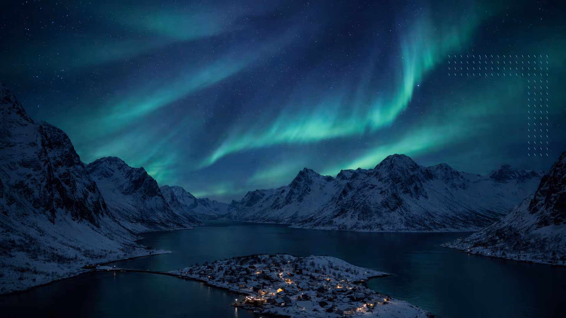 Northern lights glowing over snow-covered mountains reflected in a calm body of water under a starry sky.