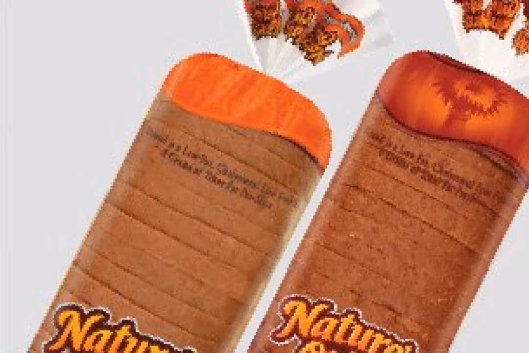 Two loaves of Nature's Own bread, one with an orange top and the other with a red top.