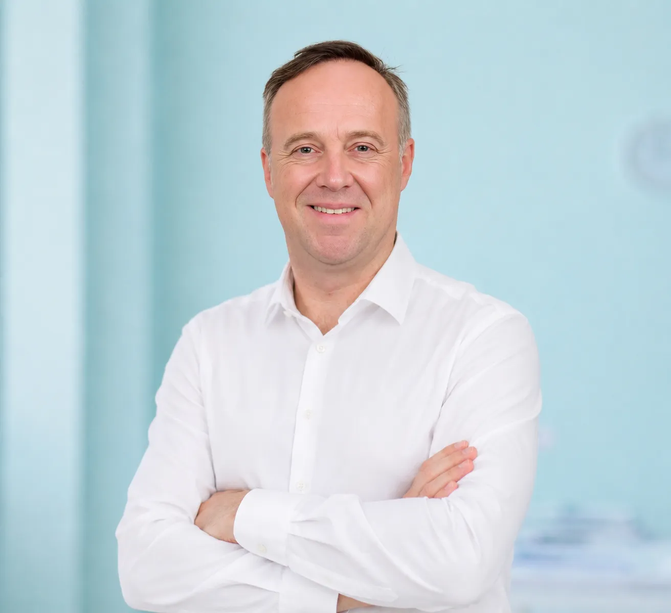 Etienne Viellard, founder of Tyos, arms folded