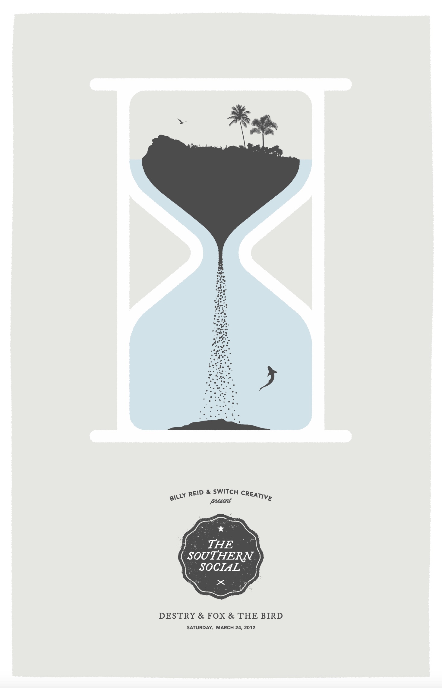 Hourglass shaped like an island with palm trees, sand falling into water with a shark below.