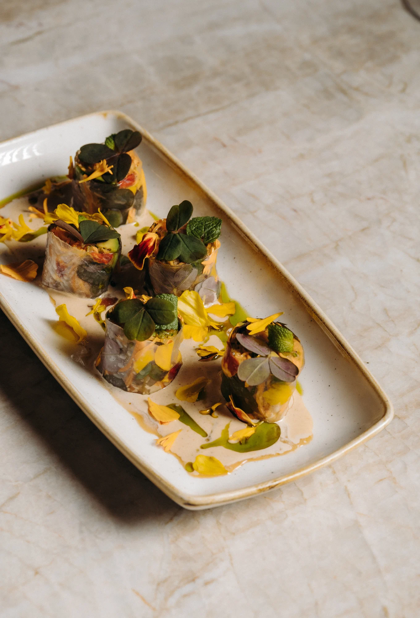 A refined dish composed of delicate bites, served at ChaCha restaurant in Courchevel, Annie Famose group.