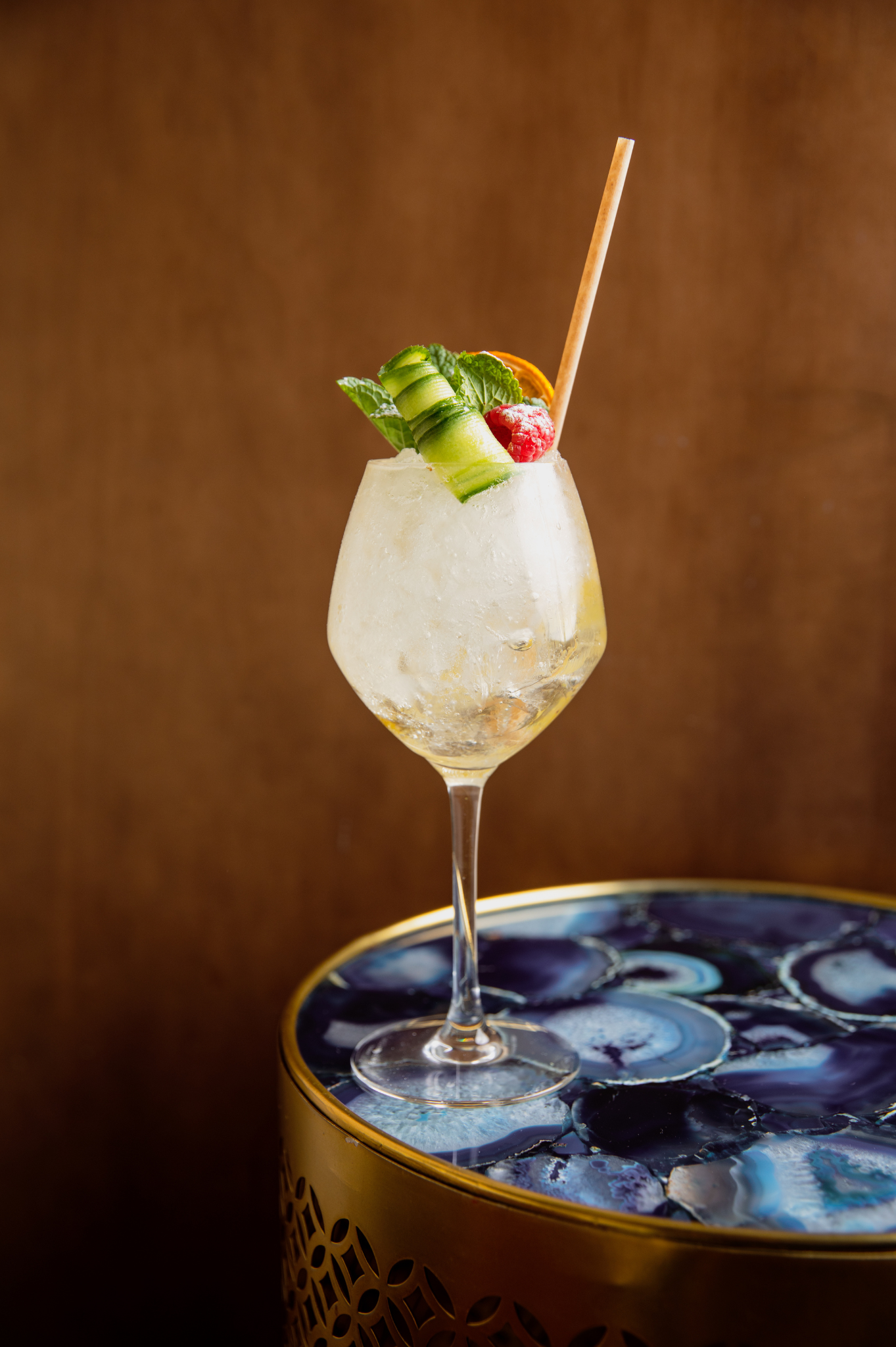 Signature cocktail served on an agate table at ChaCha restaurant, Courchevel, Annie Famose Group (AFGroupe).
