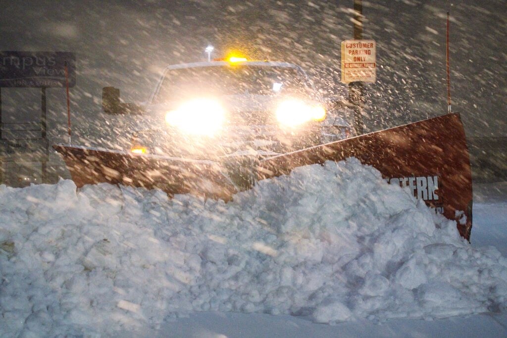snowing_front of plow_with snow