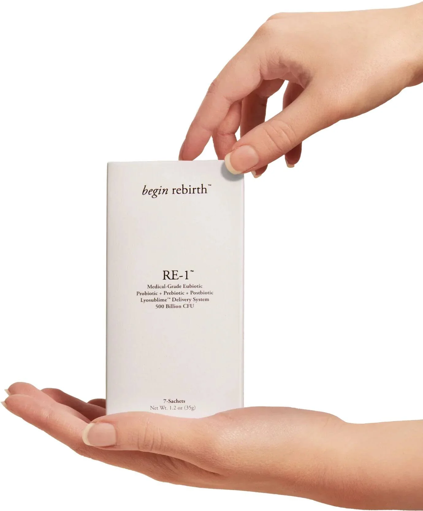 Begin Rebirth RE-1 medical-grade eubiotic sachet pack held in two hands