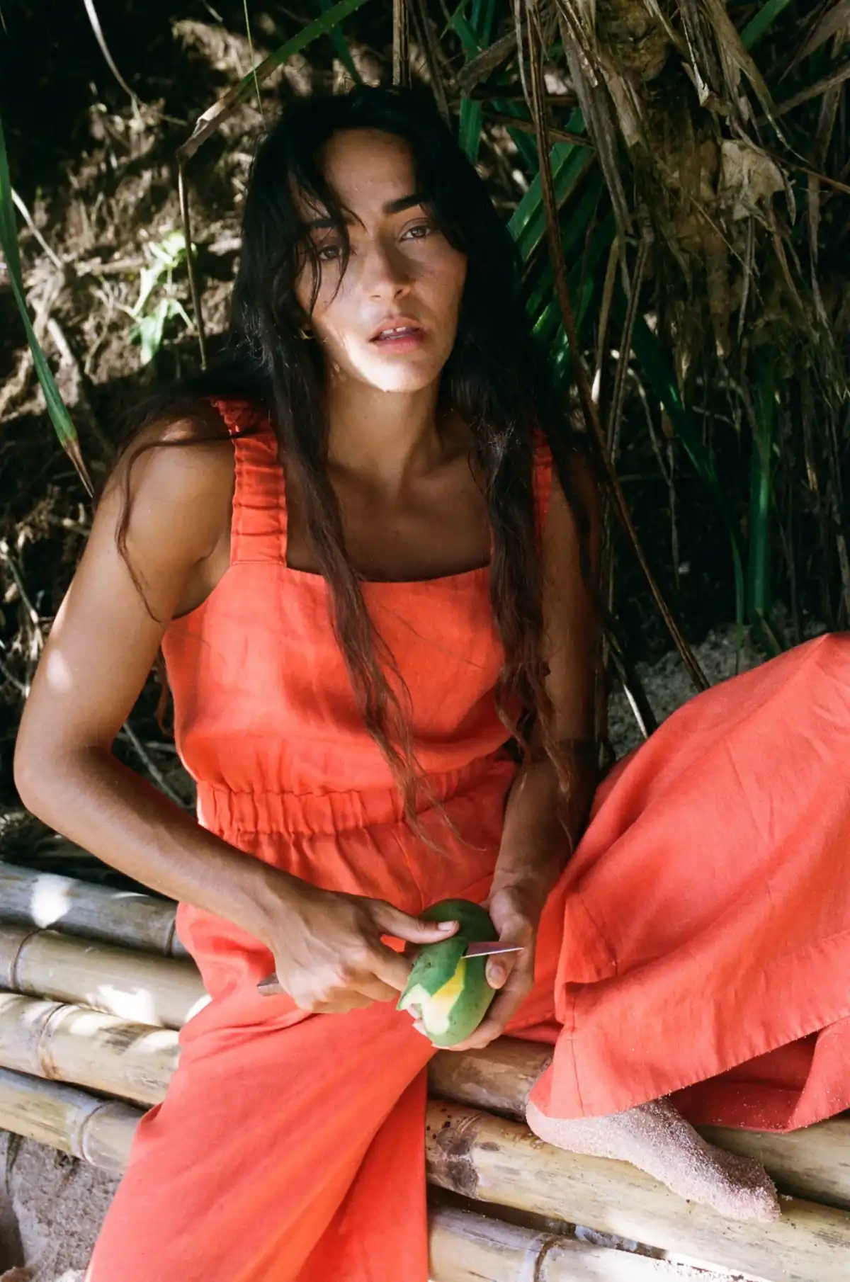 Lilly Pilly model wearing the Keely linen jumpsuit in Spritz orange