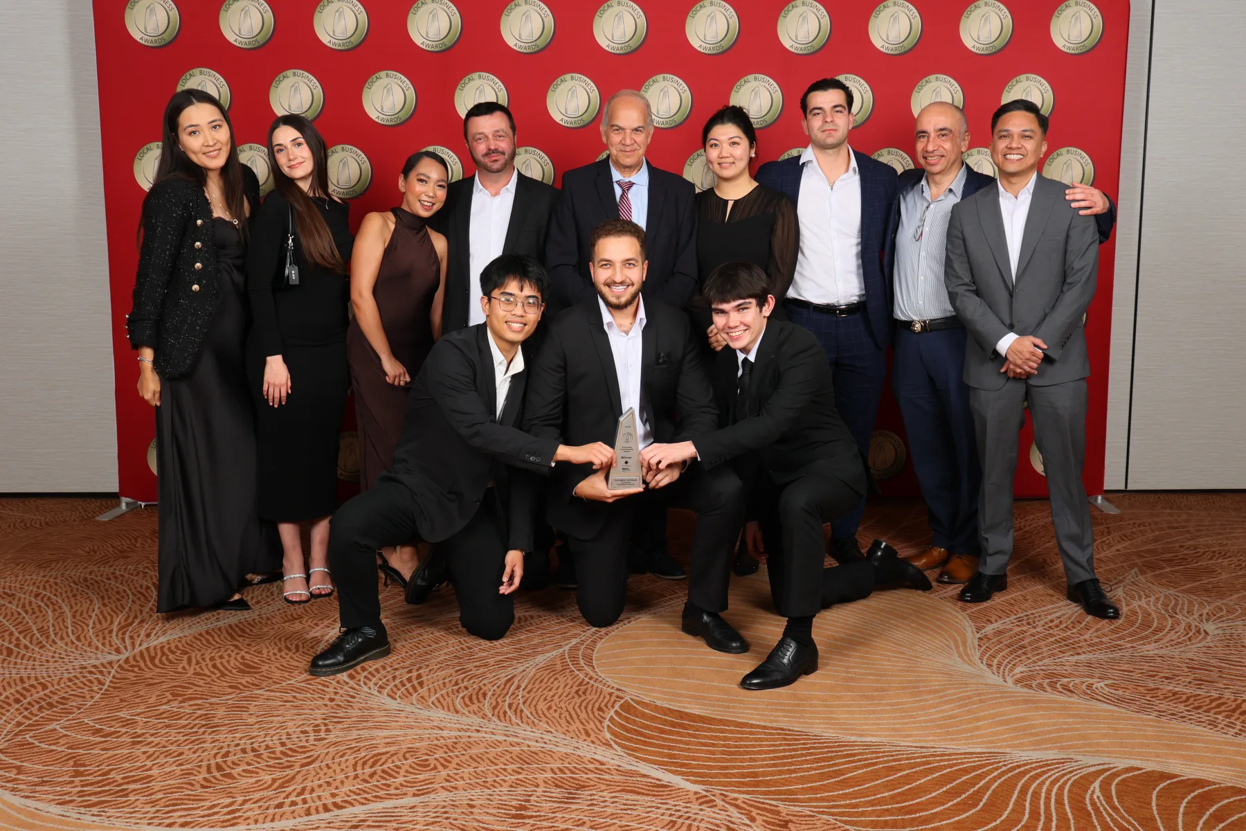 The Fulfilment Australia team with the Outstanding Specialised Business trophy at the 2026 Parramatta Local Business Awards