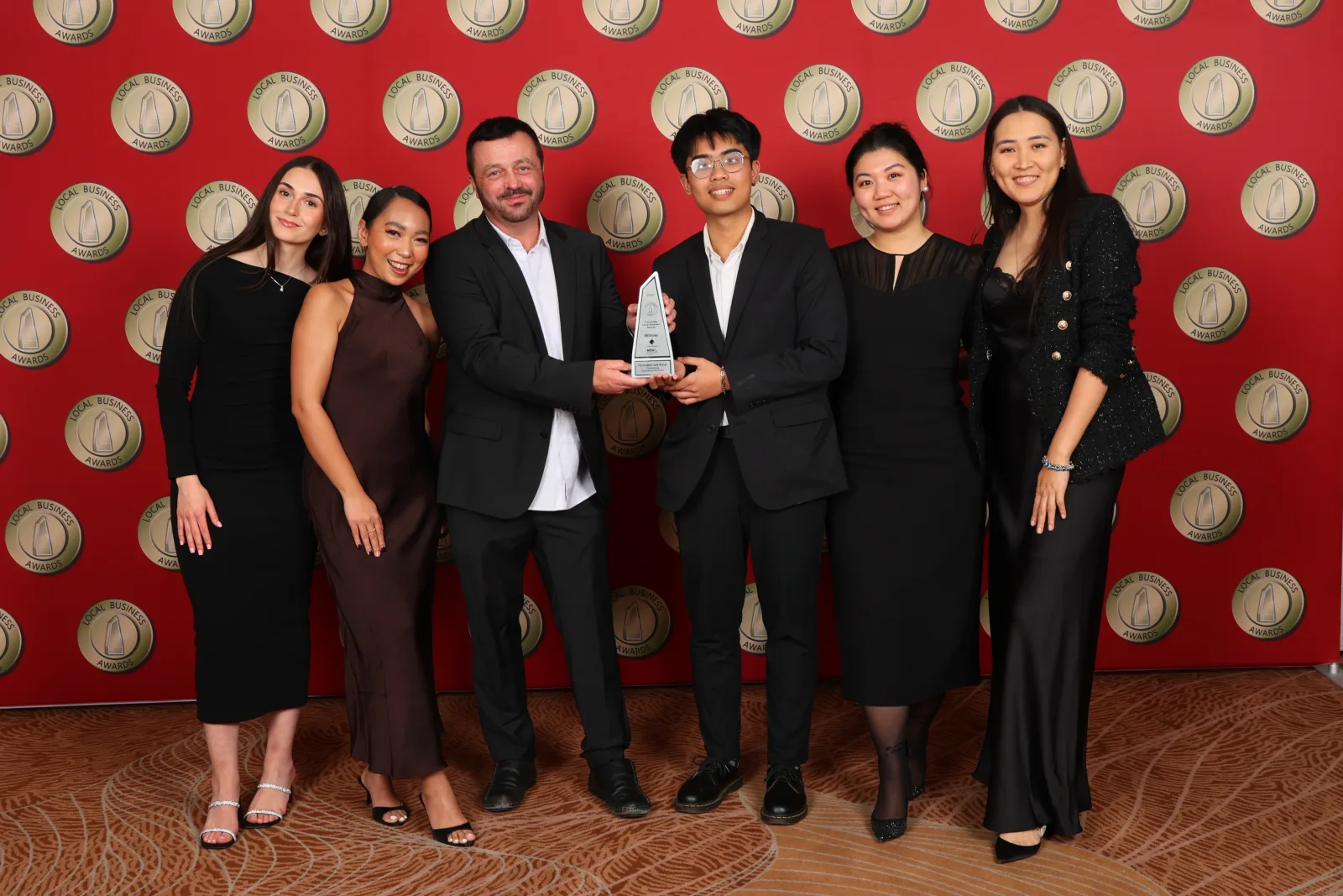 Fulfilment Australia team members with the 2026 Local Business Awards trophy