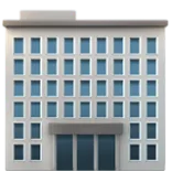 Gray office building with multiple windows and two entrance doors.