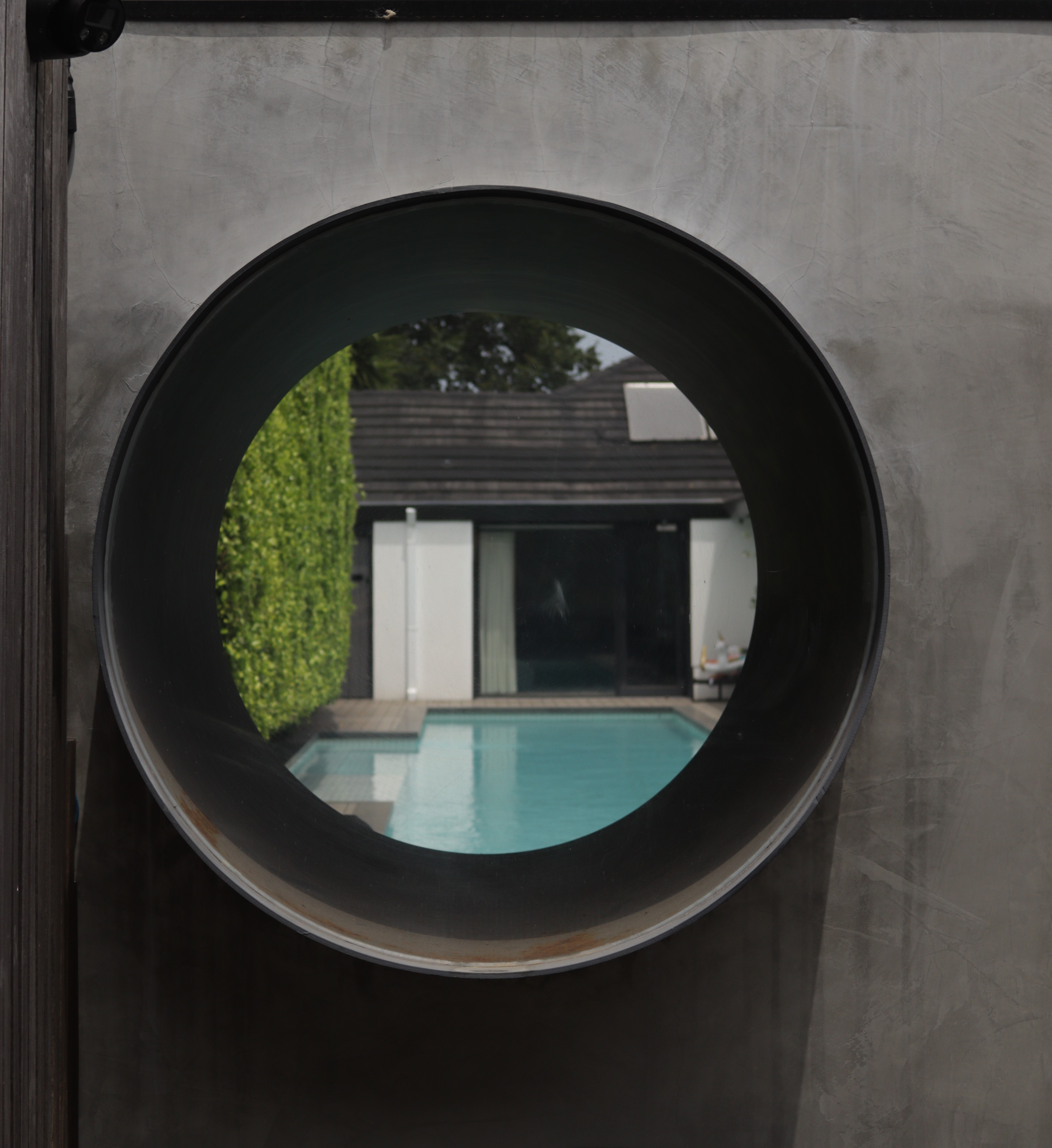 Artistic look-through window into outdoor landscape