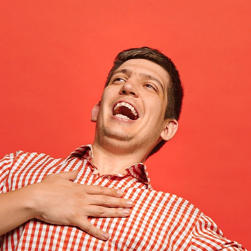 Man in red background.