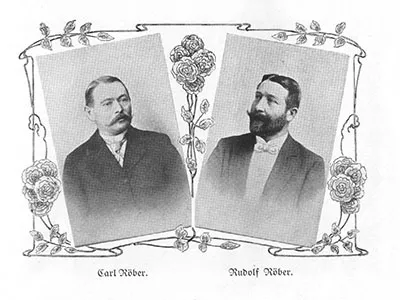 Black and white portraits of two men, Carl Röder and Rudolf Röder, framed by floral decorative border.
