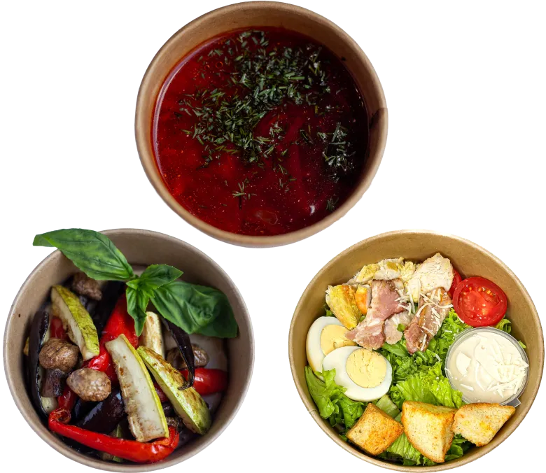 Three bowls with food: one with red soup garnished with herbs, one with roasted vegetables and basil, and one with salad including boiled egg, grilled chicken, tomato, lettuce, croutons, and dressing.