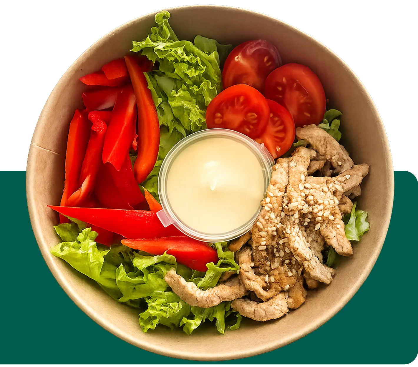 Bowl with fresh green lettuce, red bell pepper strips, cherry tomato halves, cooked beef strips topped with sesame seeds, and a container of creamy dressing.