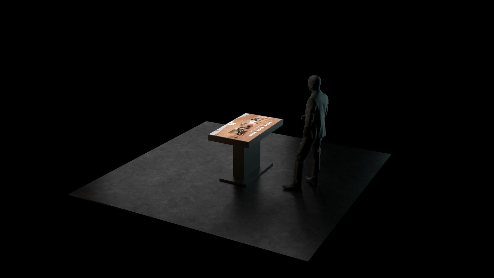 A man standing infront of interactive touch table