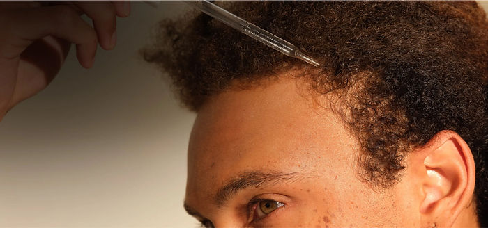 Minoxidil in haar