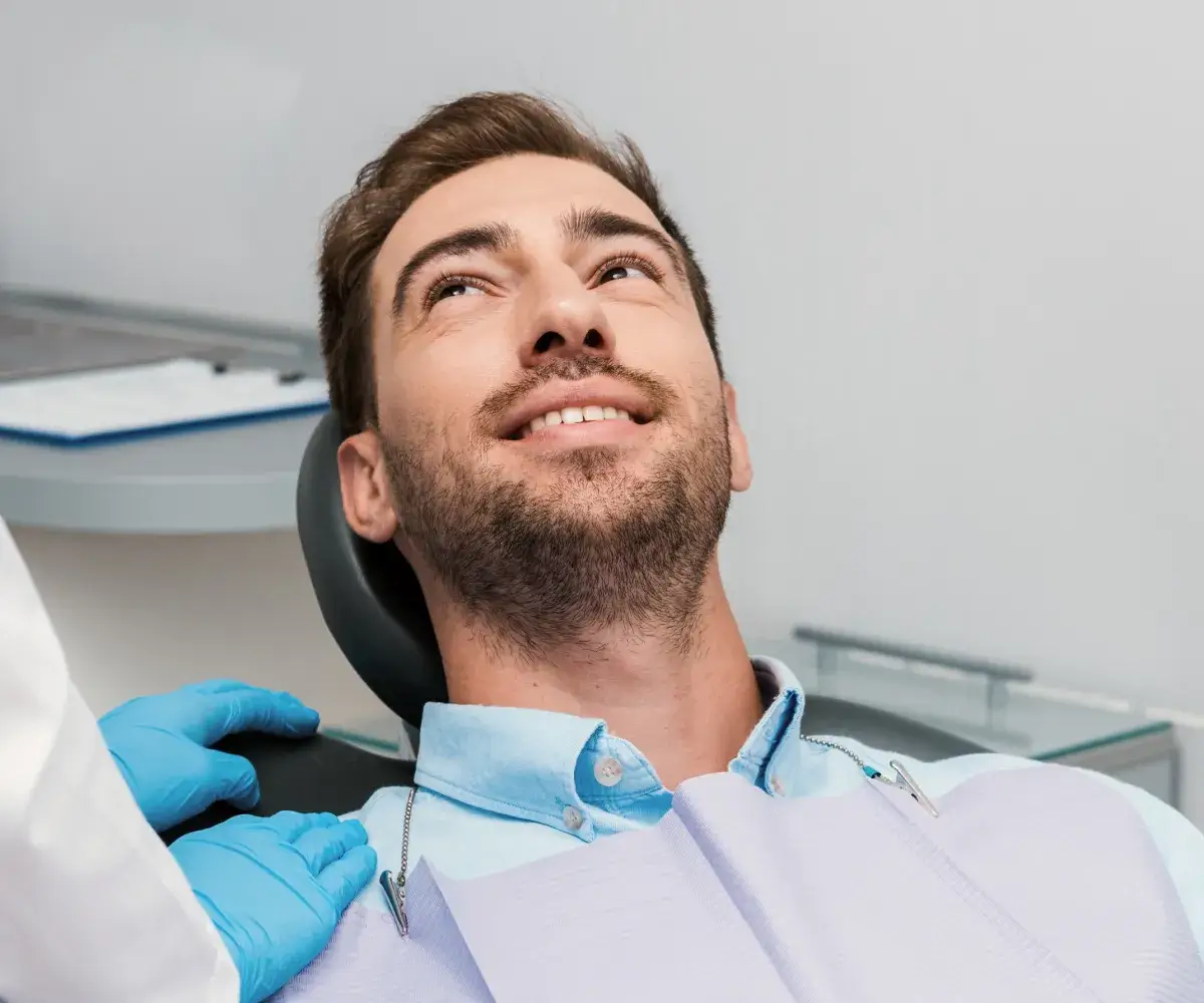 Man in dentist office.