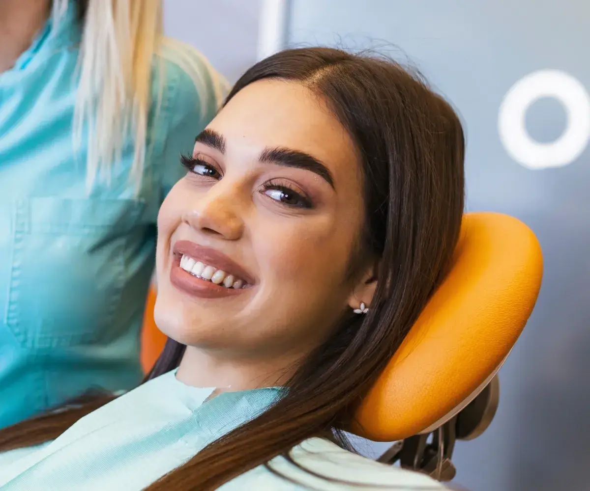 woman smiling in dentist chair
