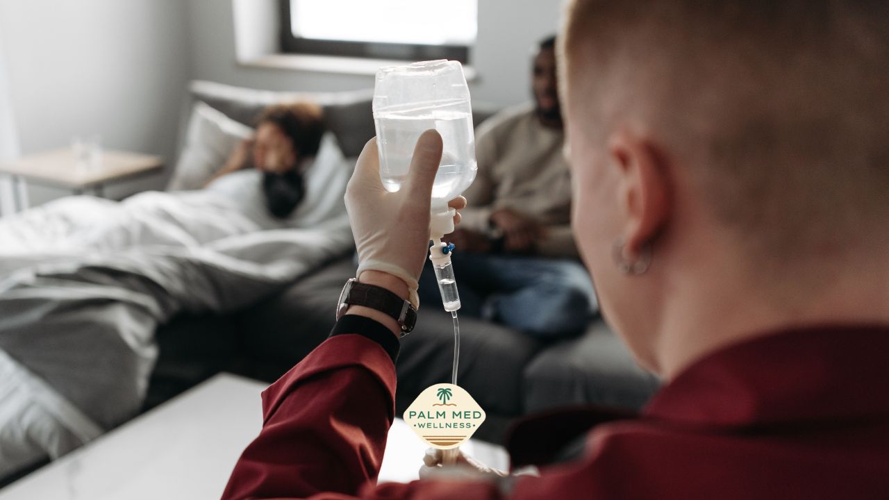 Mobile IV therapy session administered at home by a Palm Med Wellness professional.