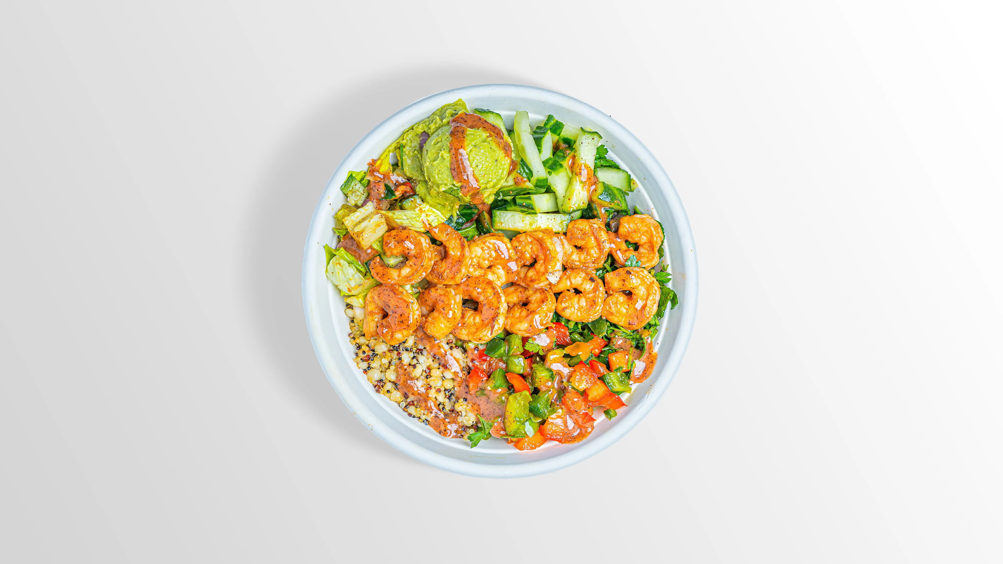 Shrimp Bowl with quinoa, guacamole, cucumber and sweet pepper