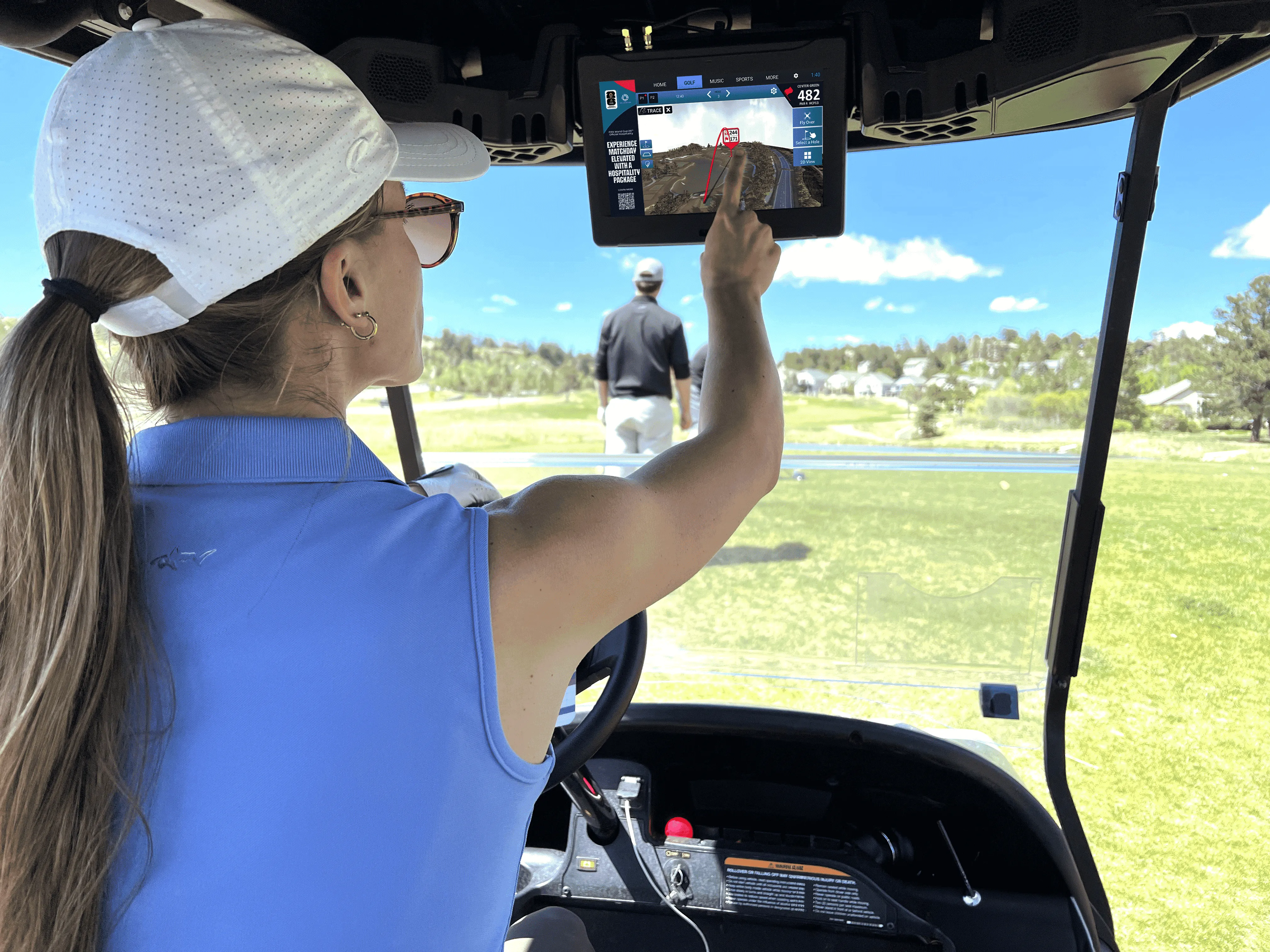 Female Golfer Interacting with Tracer