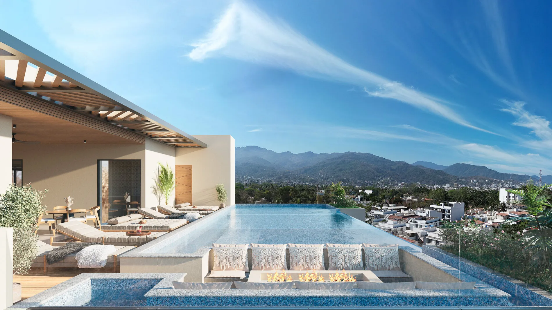 Rooftop infinity pool and fire pit at Terra 242 with panoramic mountain and city views in Puerto Vallarta.