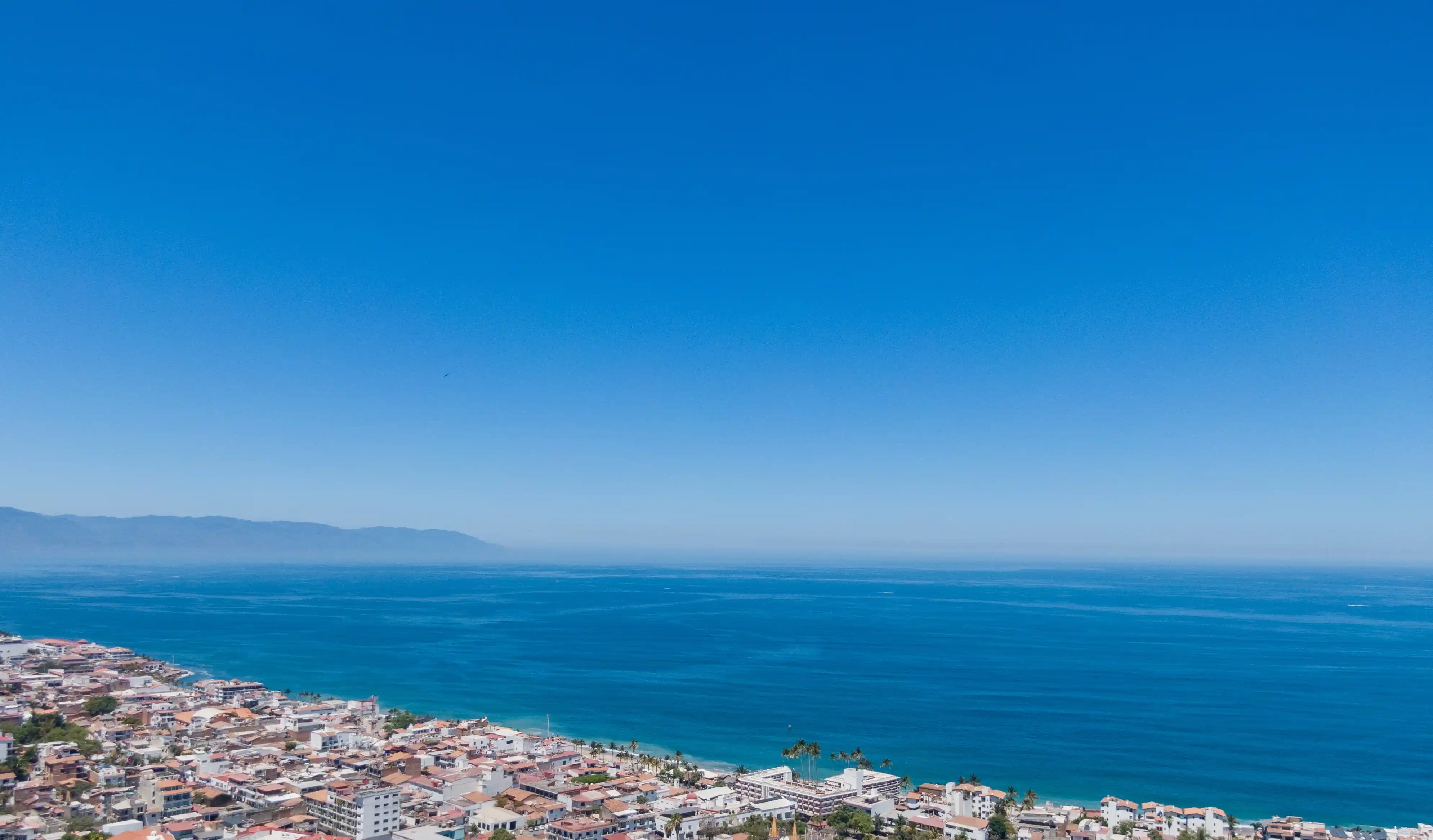 Stunning panoramic ocean and horizon view of Banderas Bay from the rooftop pool at the MDY development in Puerto Vallarta.
