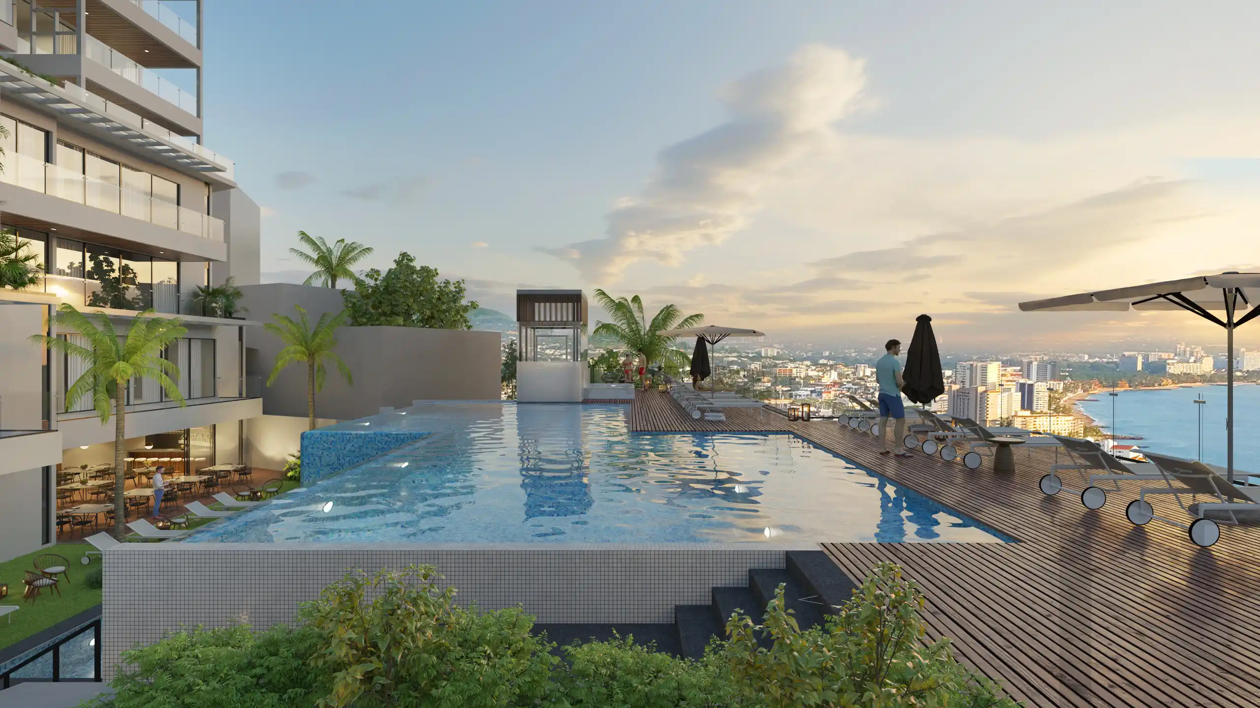 Swimming area and lounge chairs inside the MDY residential complex, highlighting interior design and common area lighting.