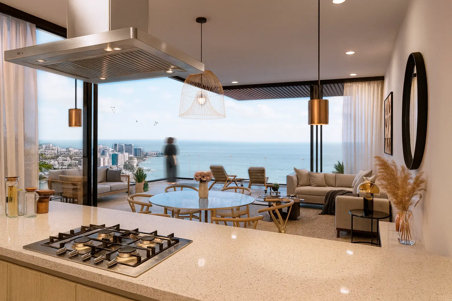 Open-concept living and dining room connecting to the terrace at MDY, showcasing an indoor-outdoor living lifestyle in Puerto Vallarta.