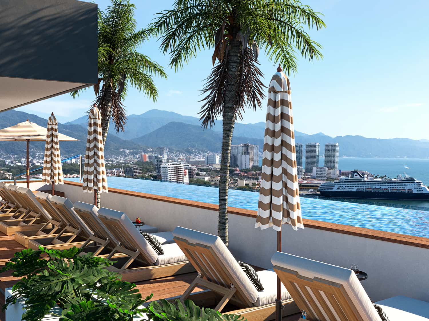 Luxury rooftop pool lounge with palm trees overlooking Banderas Bay at DUE