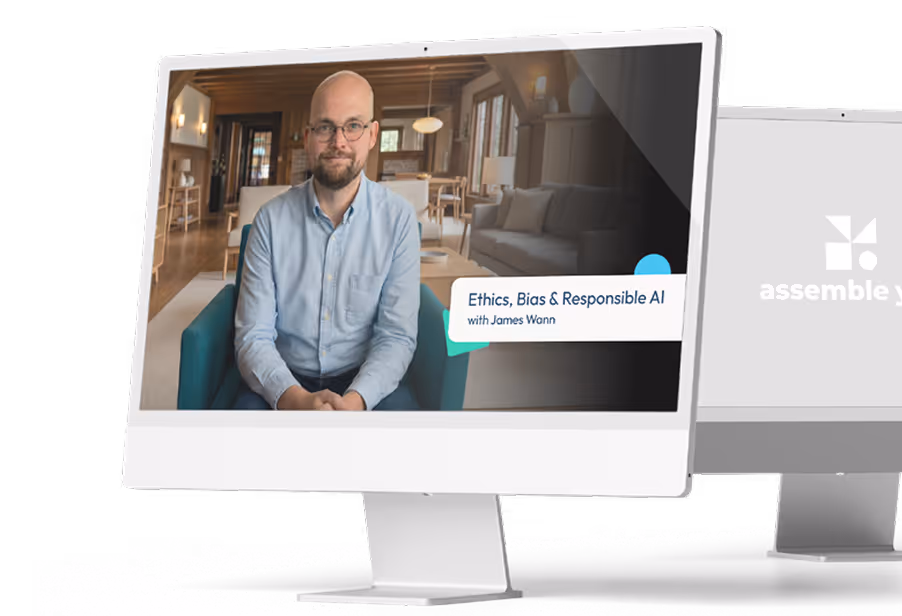 Computer screen showing a man with glasses seated, with text 'Ethics, Bias & Responsible AI with James Wann' in a modern living room.