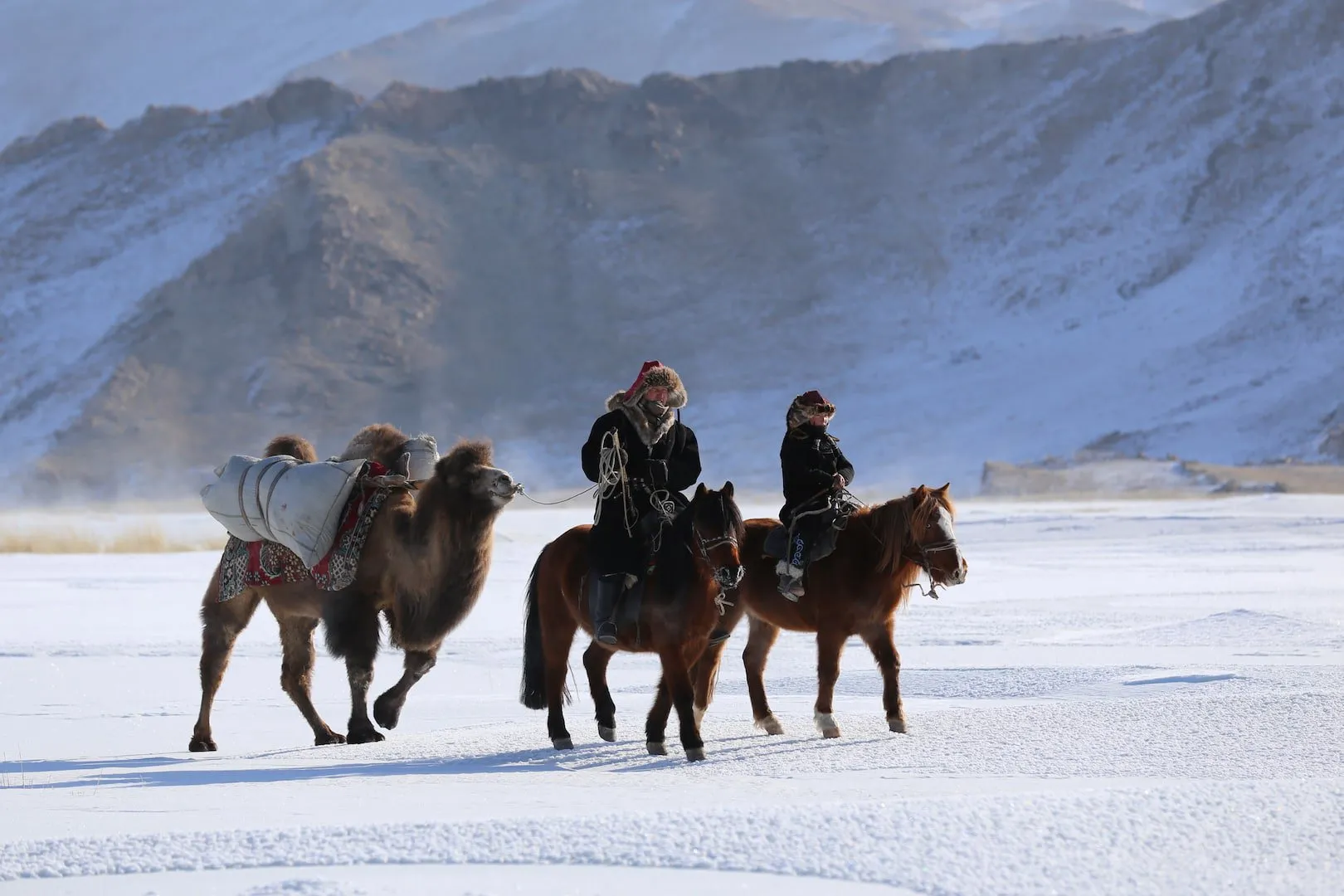 Kazakh nomads in the Altai Mountains set out on the winter migration.
