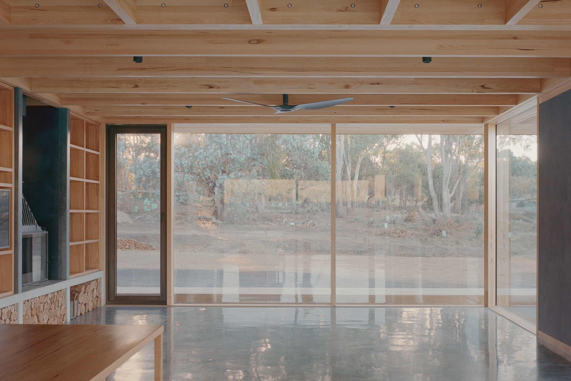 prefabricated fully glazed facade exposed timber ceiling