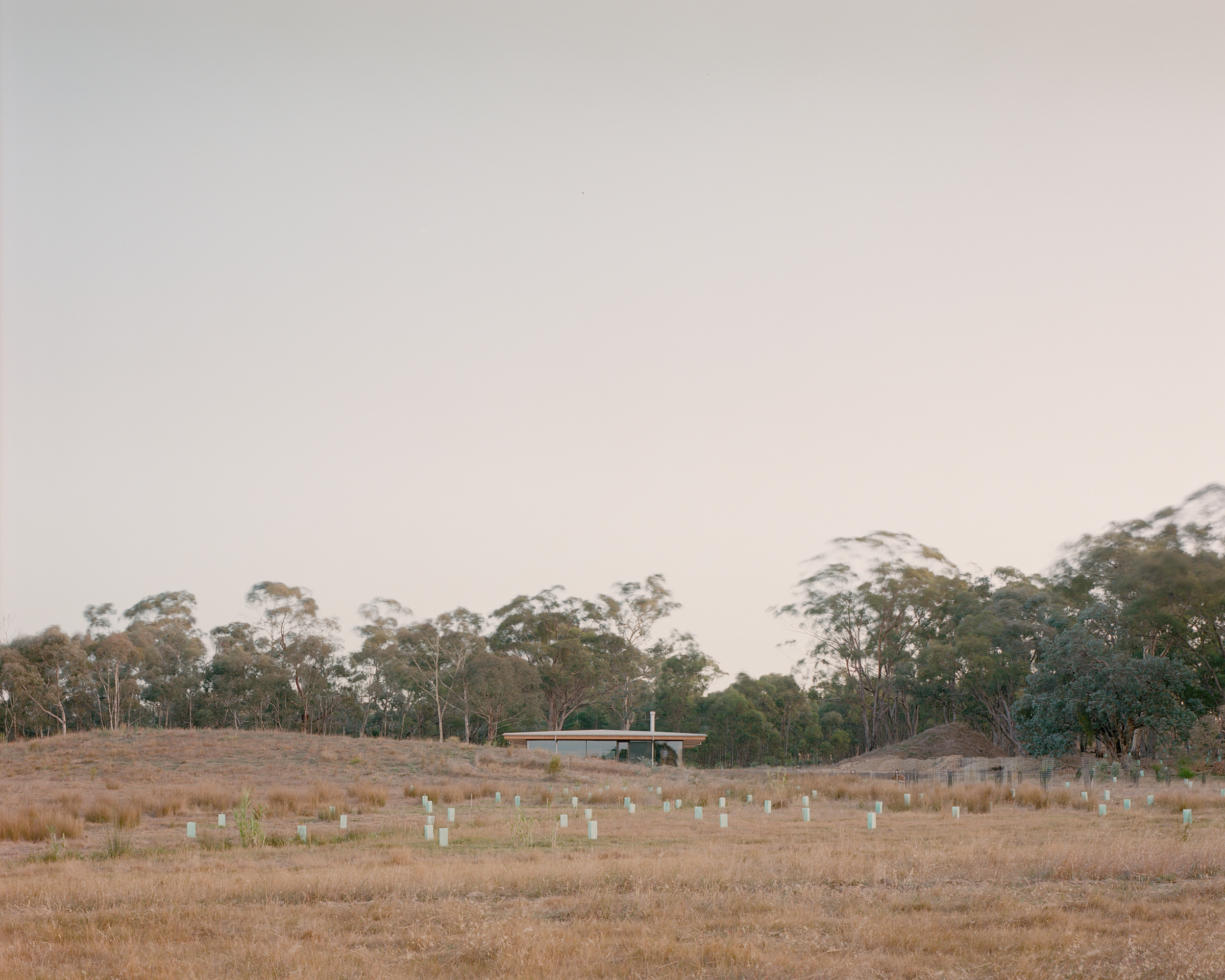 prefabricated fully glazed facade exposed timber ceiling