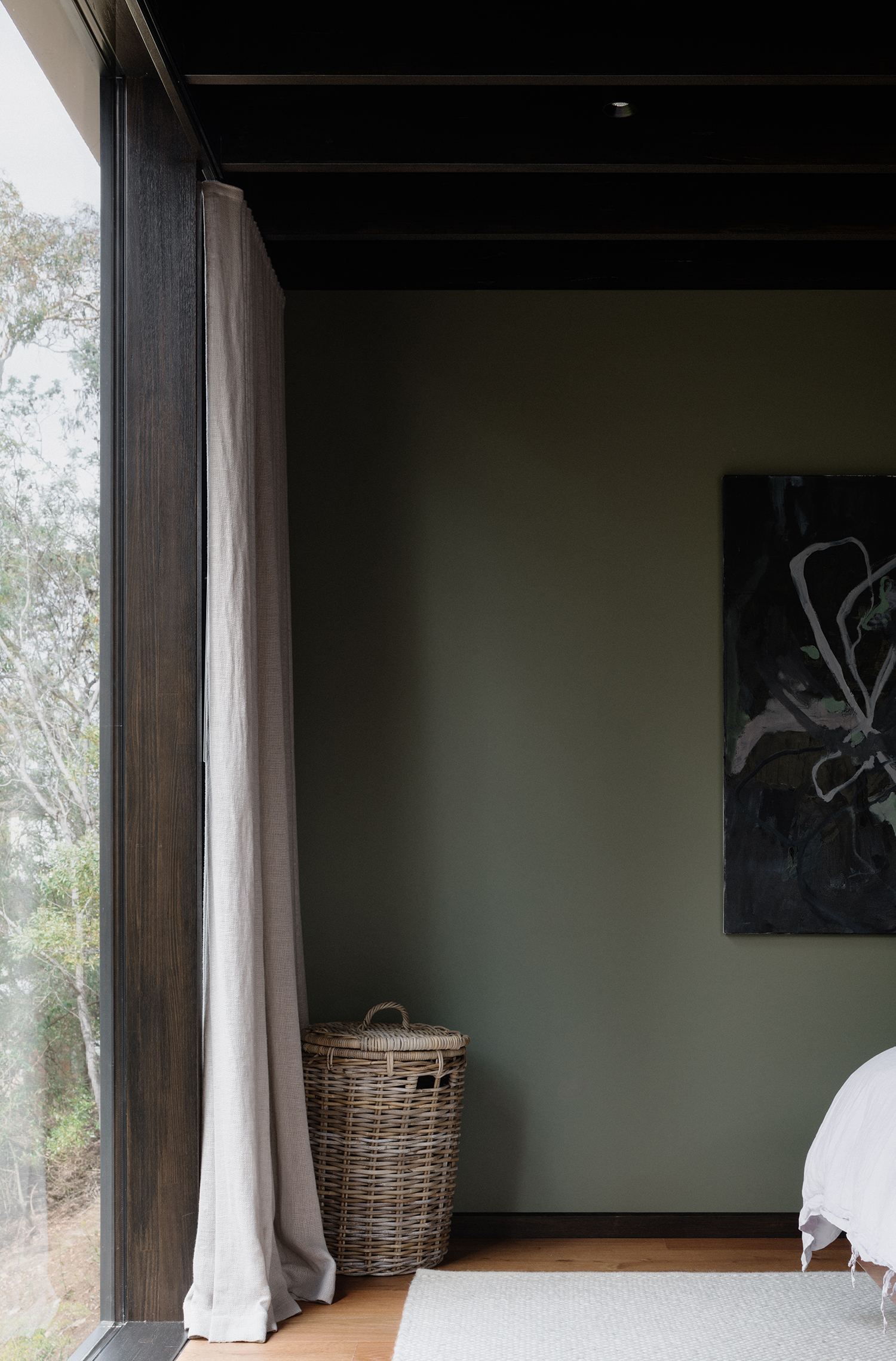 prefabricated steep site fully glazed facade exposed timber ceiling