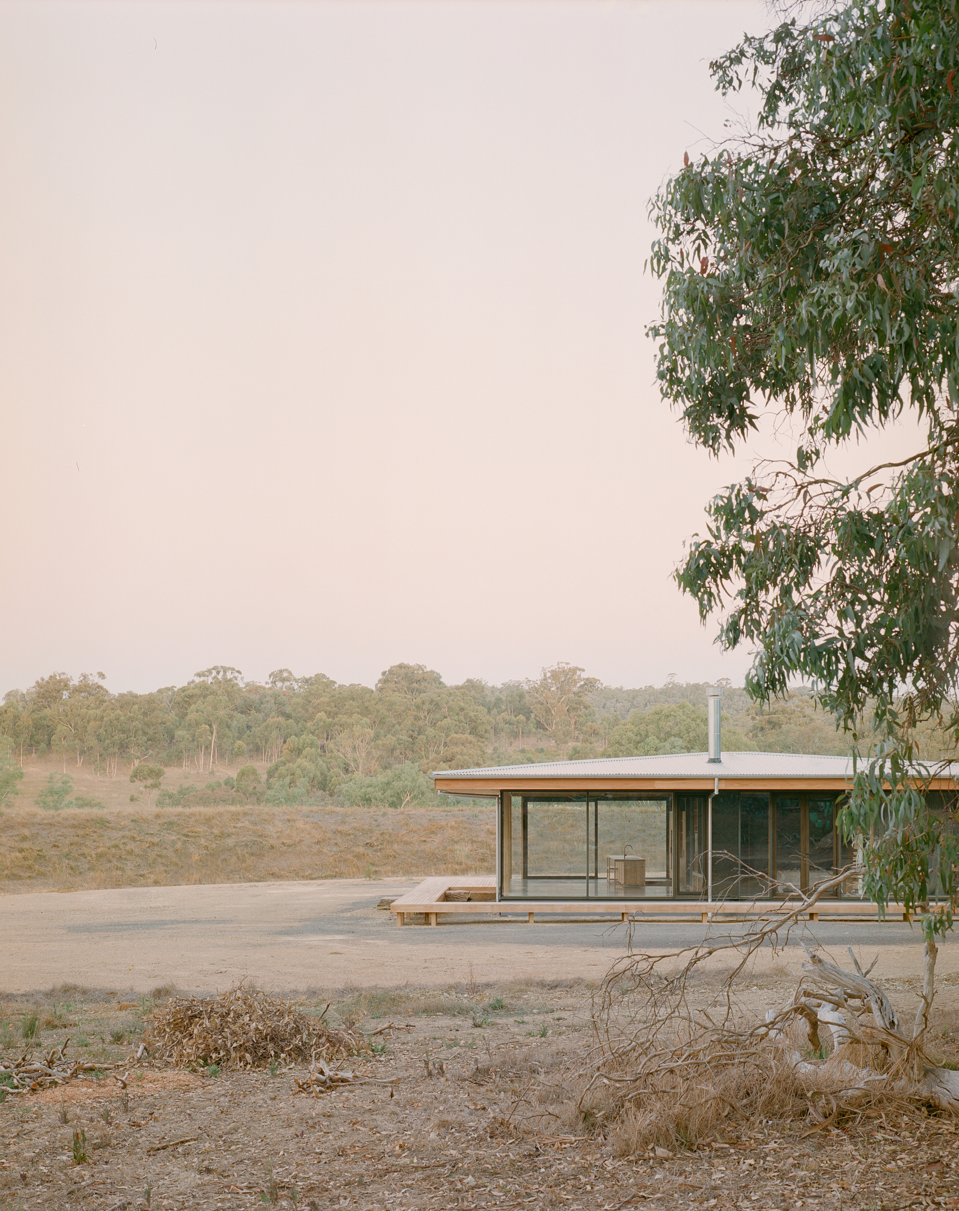 prefabricated fully glazed facade exposed timber ceiling