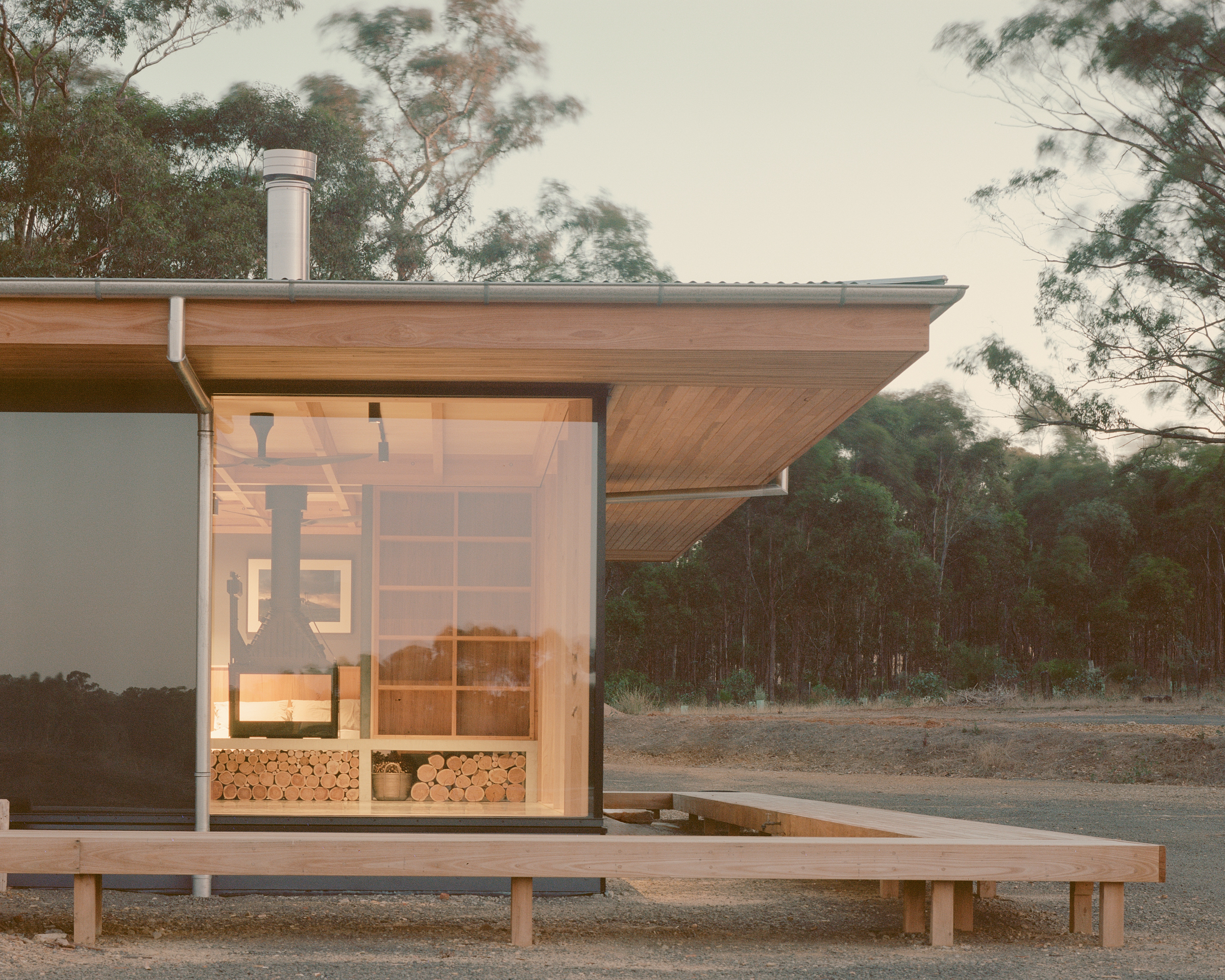 prefabricated fully glazed facade with large eave