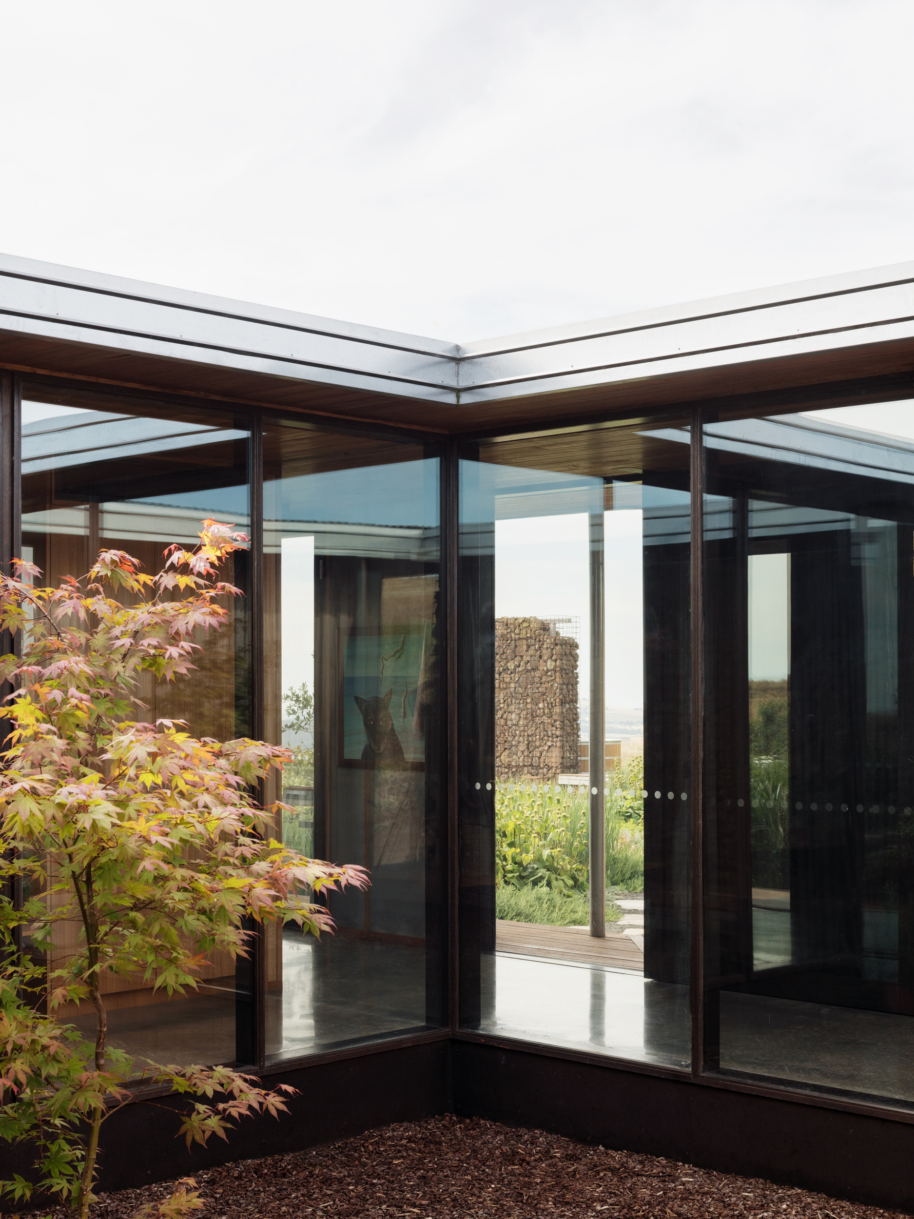 cross section of glazed walls from courtyard