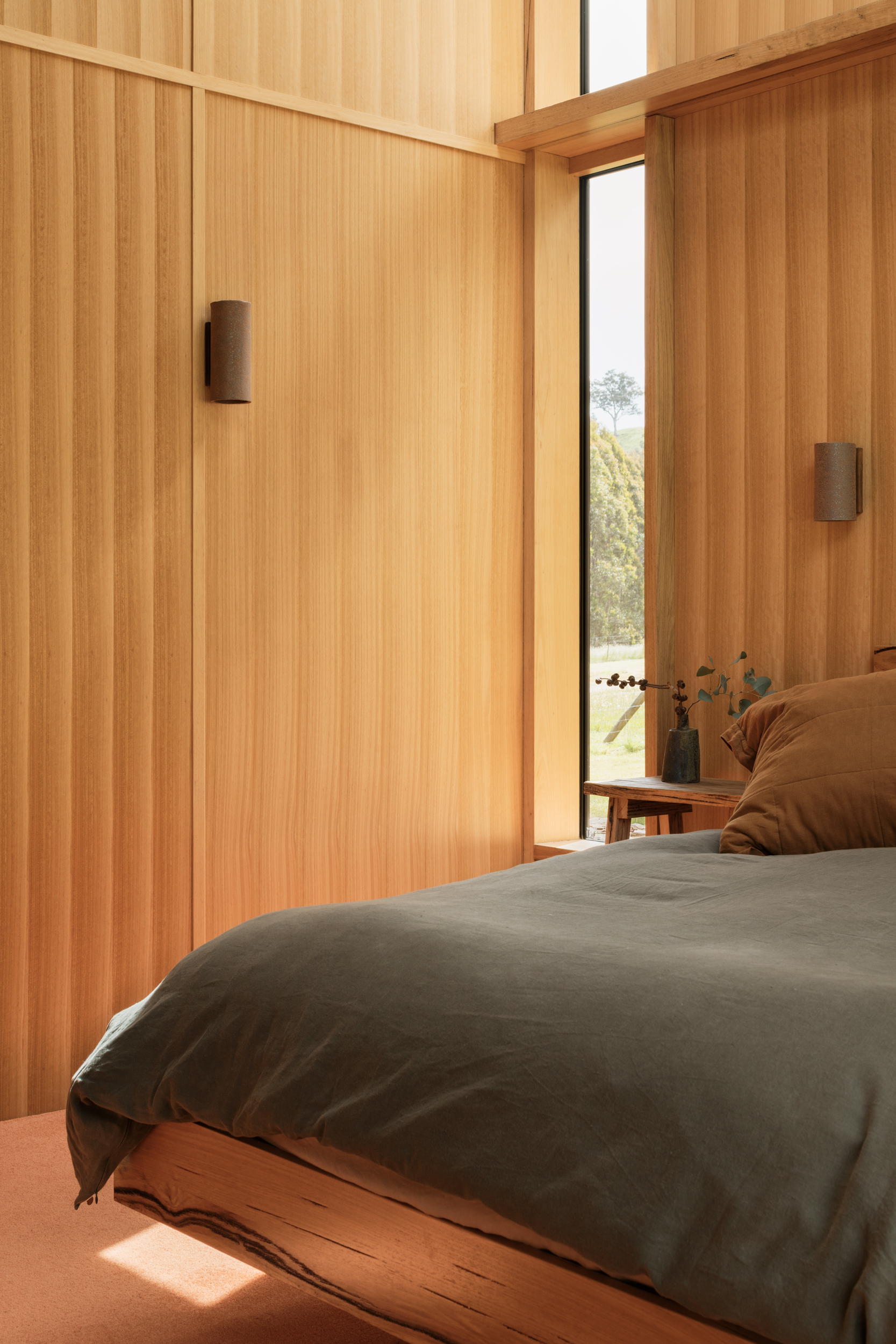 full height windows and timber wall lining