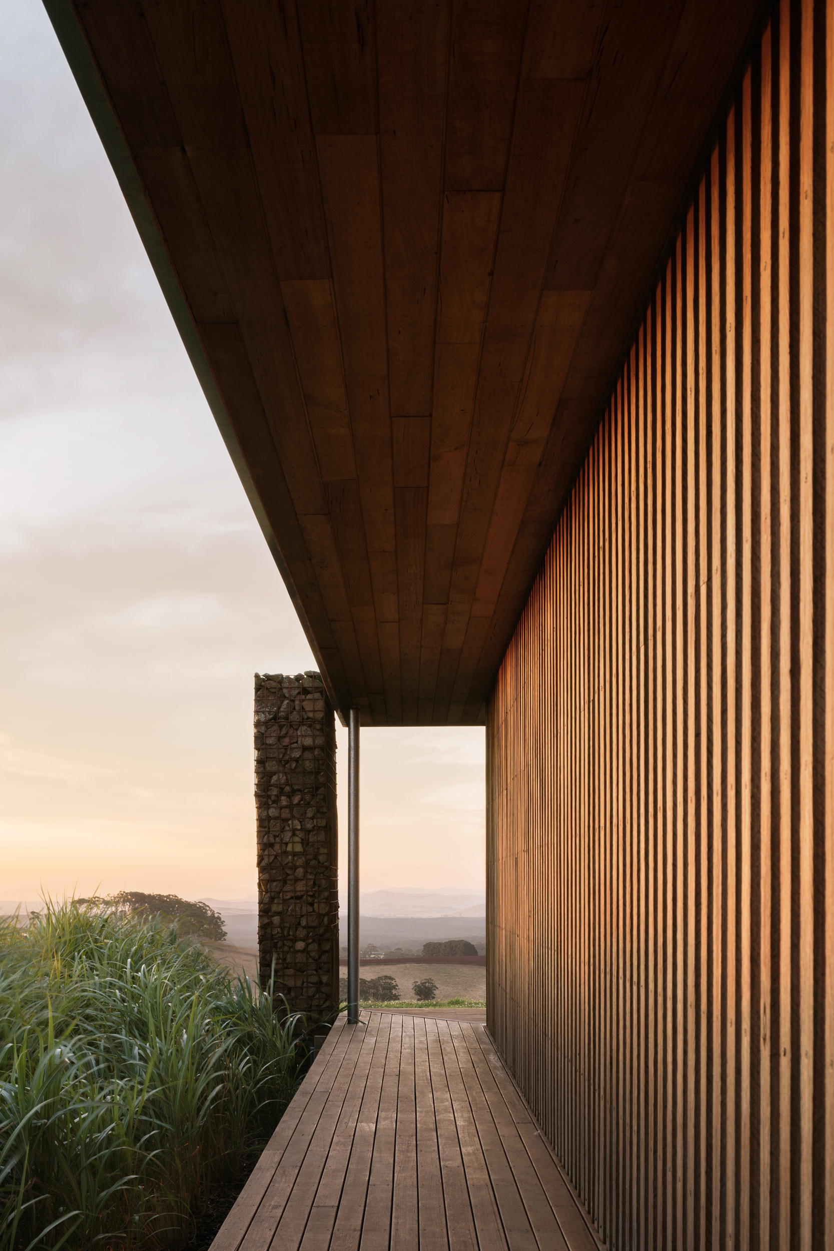 timber cladding gabion wall from deck
