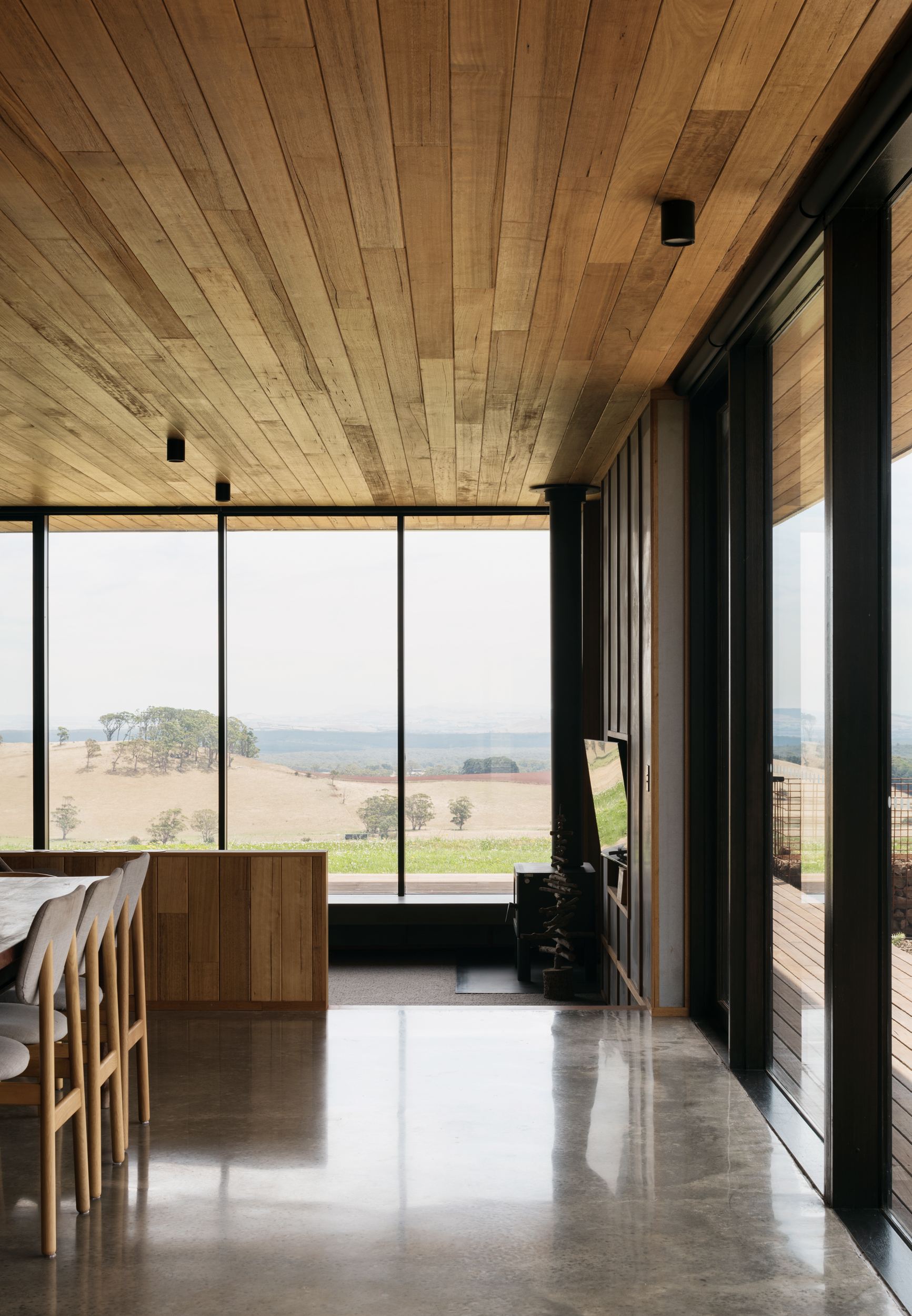 concrete floors and timber ceiling