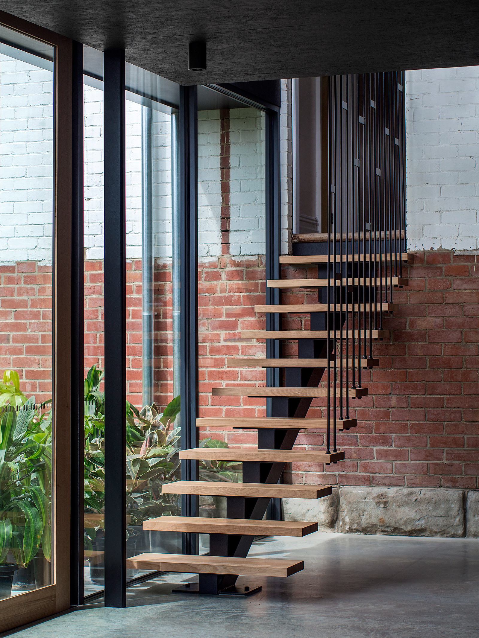 floating timber stairway concrete floor