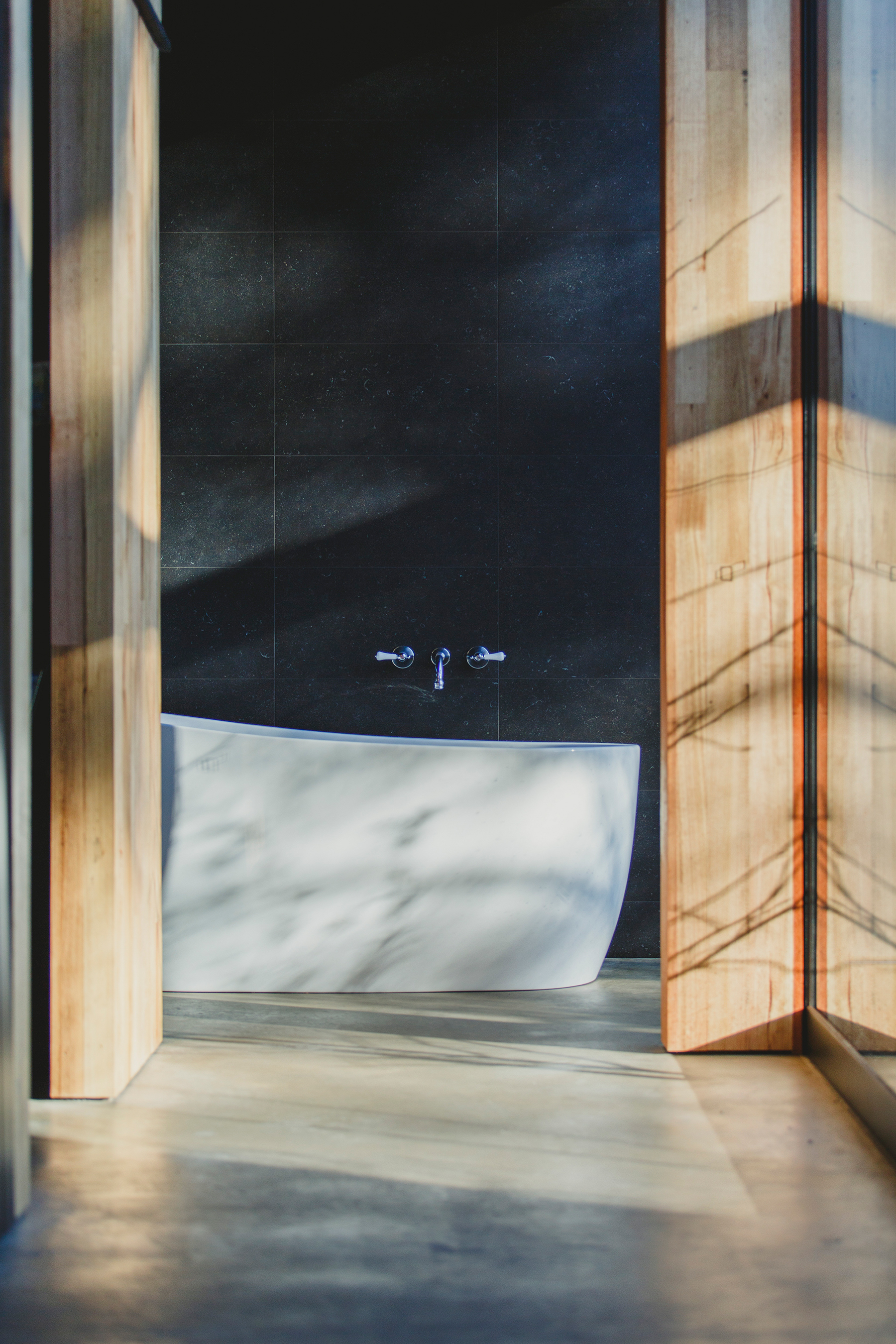 shadow and light movement from full height glazing