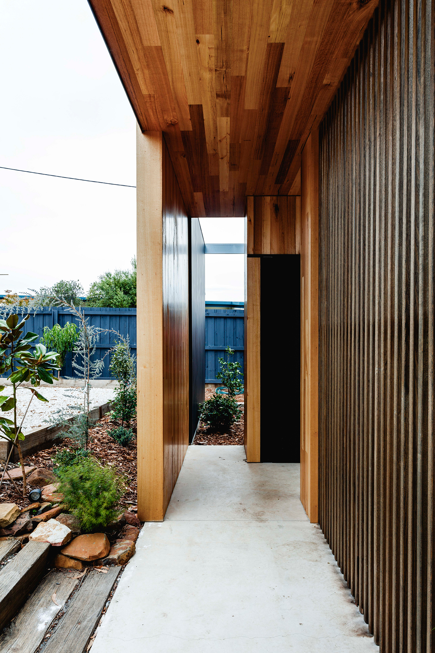 timber eaves provide thermal comfort for full height glazing