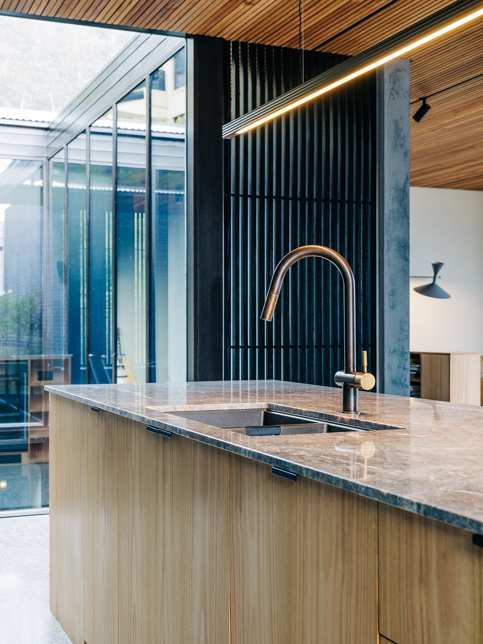 brass pendant over kitchen island
