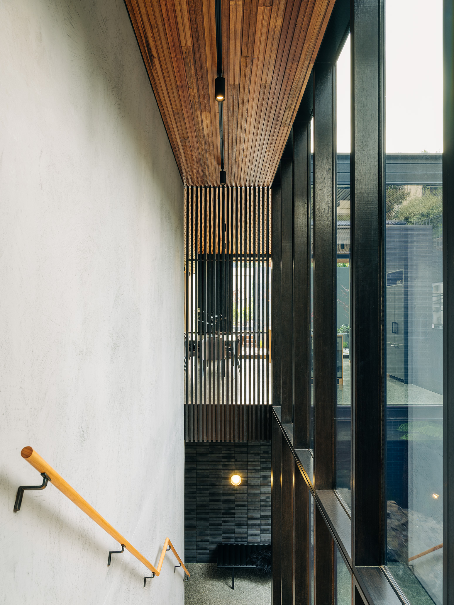 timber ceiling and full height glazing to stairwell
