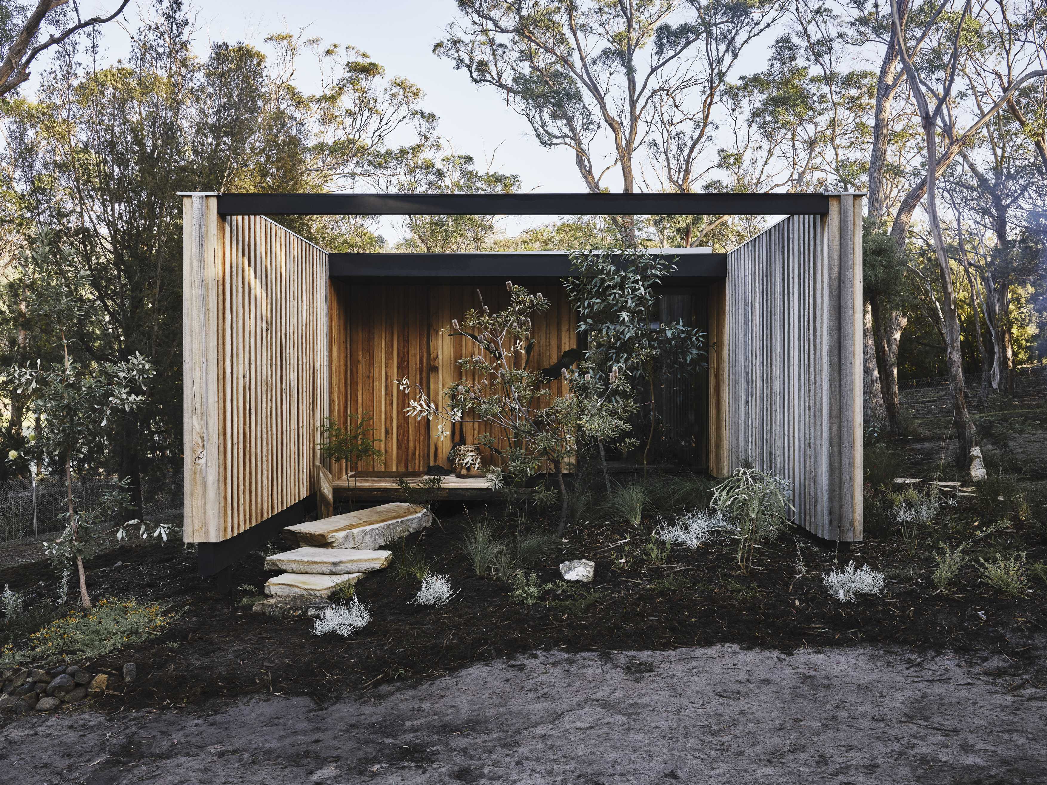small timber dwelling in bush