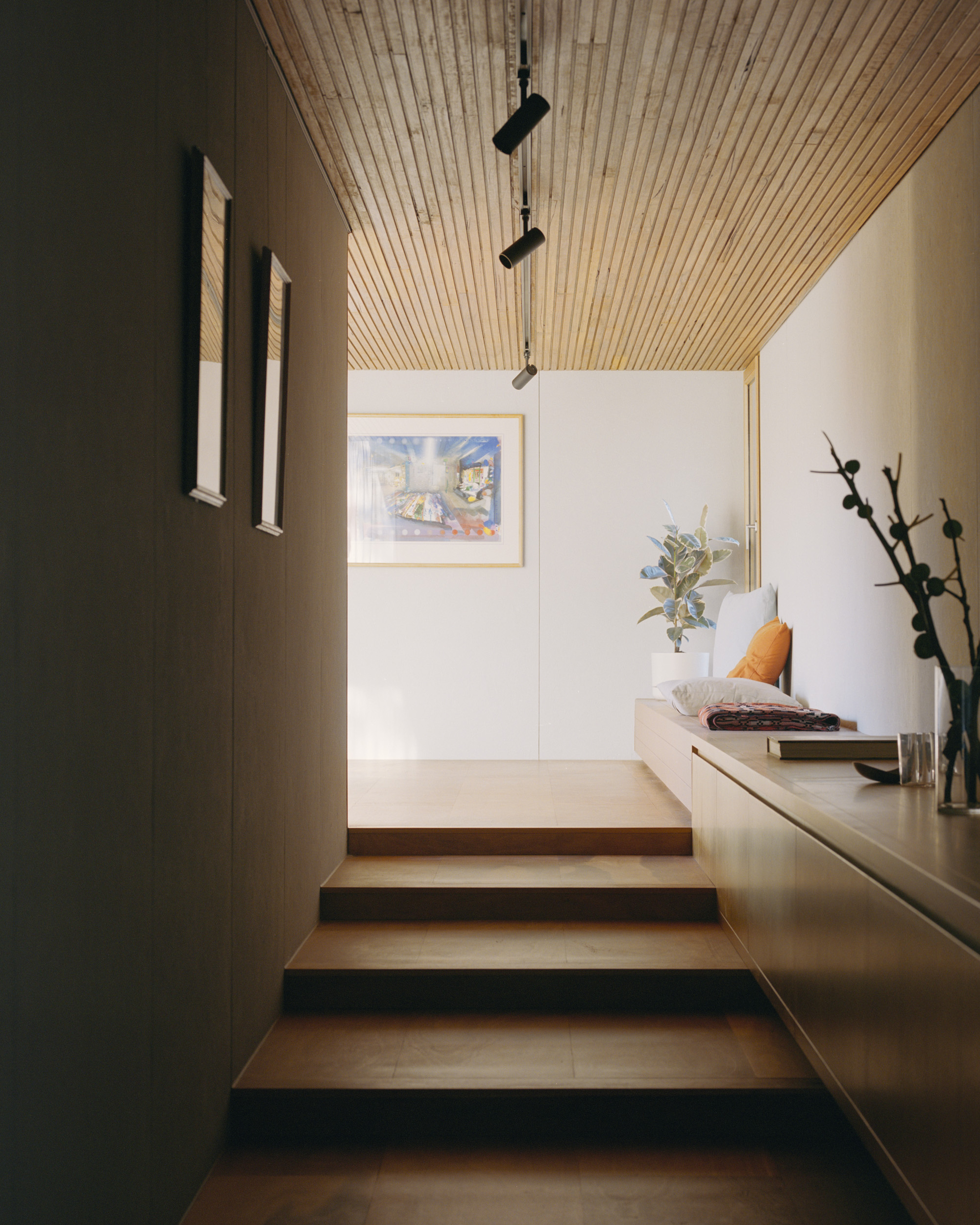 low wide timber steps in hallway