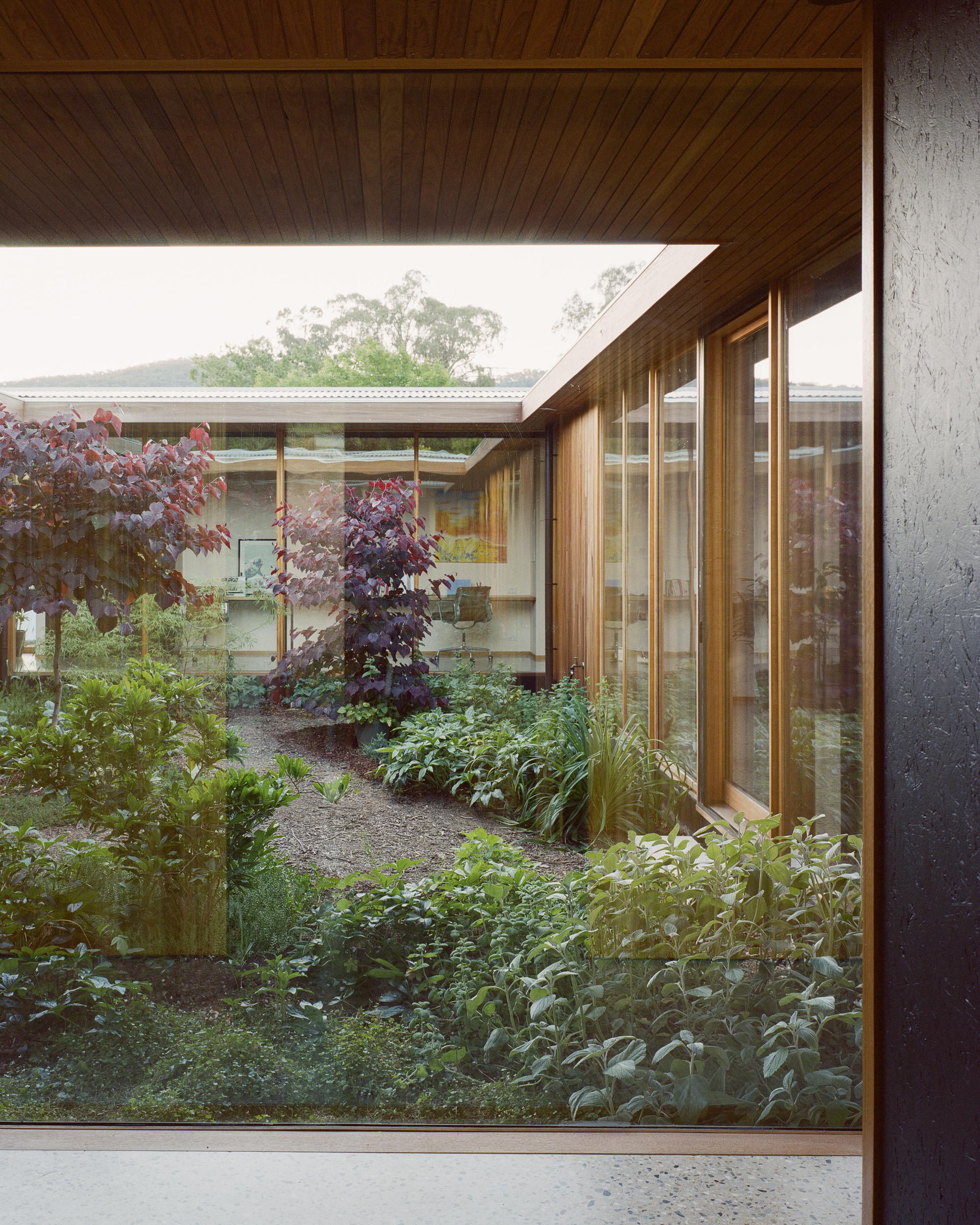 full height glazing architectural country home connection to garden