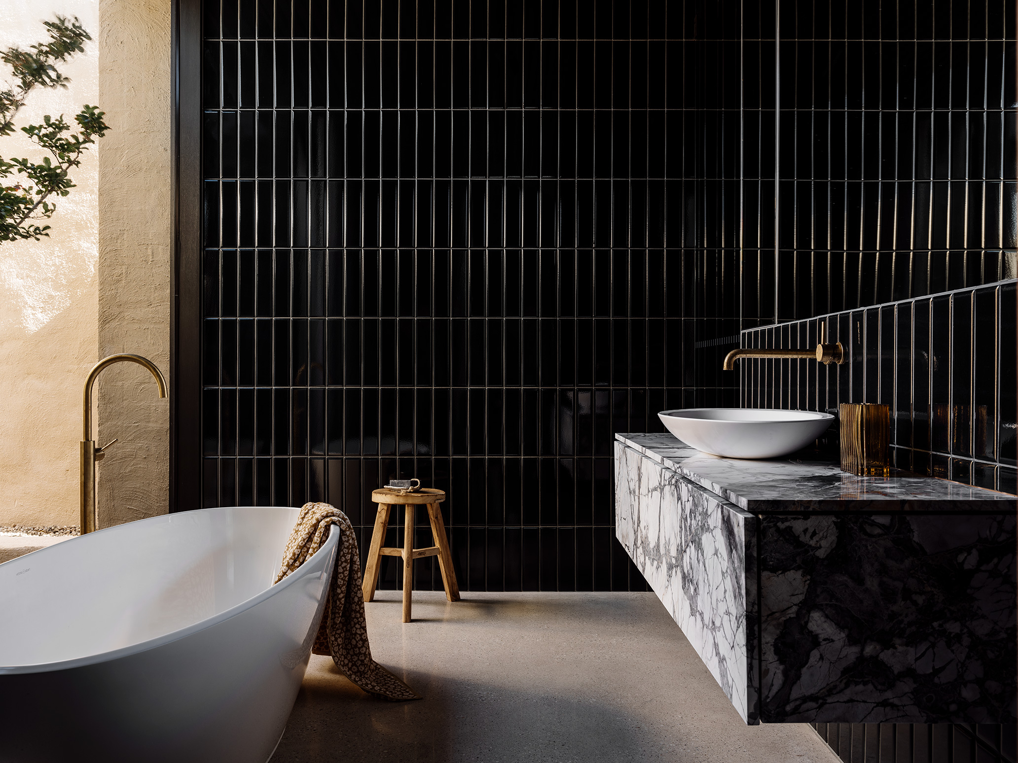 open bath in bathroom with dual basins